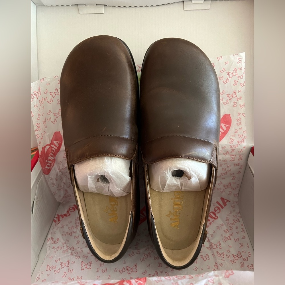 Algeria clogs.  Brown leather